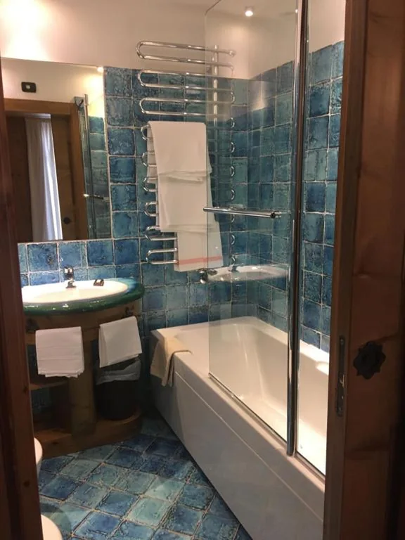 Standard Single Room — Hotel Cortina