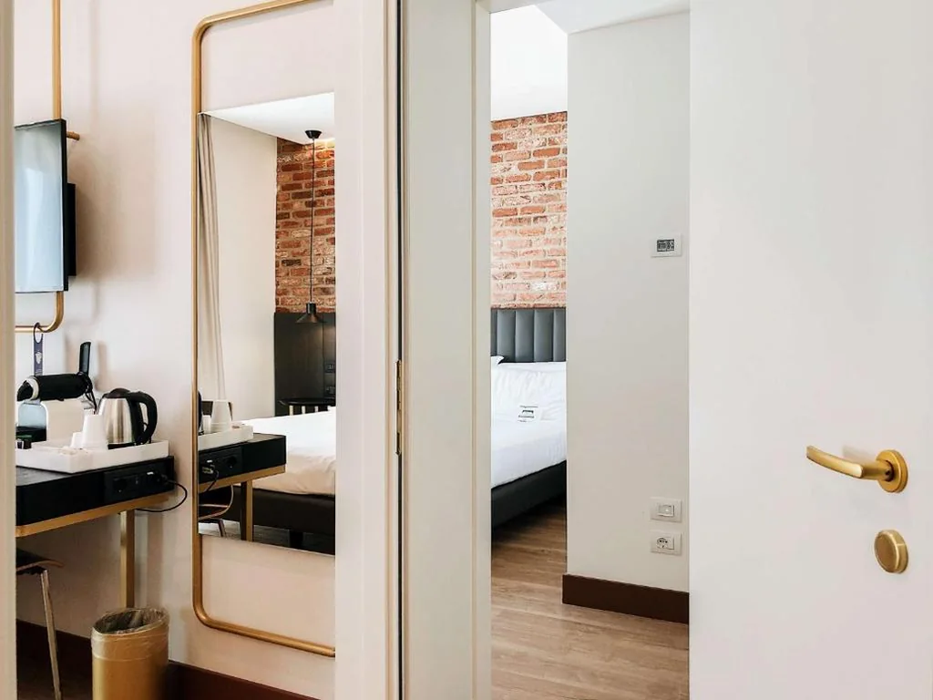 Camera Superior Comunicante con 1 Letto Matrimoniale e 2 Letti Singoli — Best Western Hotel Tritone