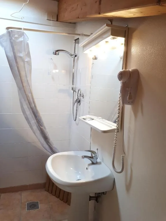 Basic Triple Room - Attic — Hotel Villa Dina