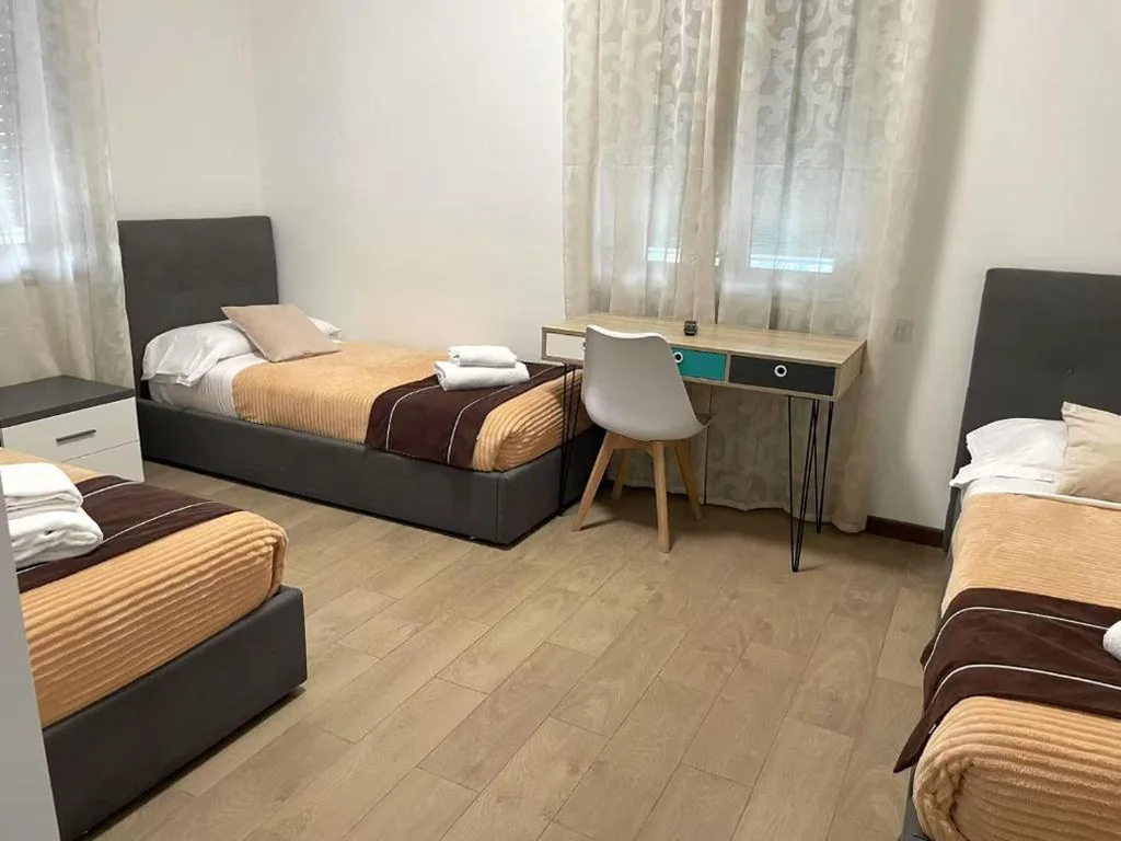 Camera Tripla Classic — FIERA ROOMS