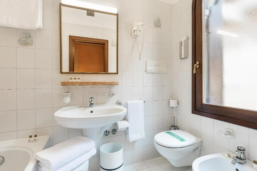 Classic Triple Room — Hotel Marconi
