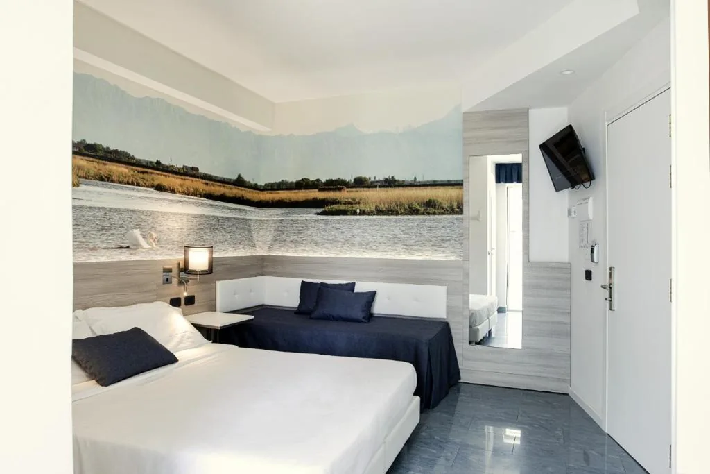 Classic Triple Room — Hotel Parigi