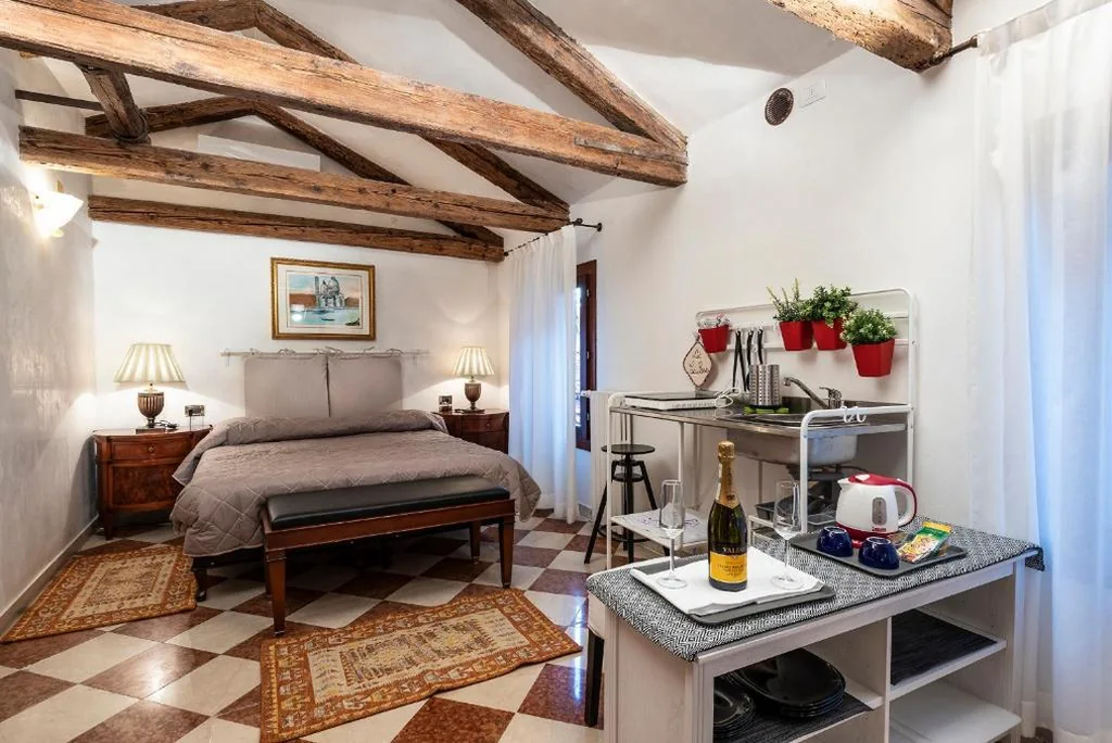 Camera Tripla Con Angolo Cottura — Anzolo Palace – Rooms & Apartments