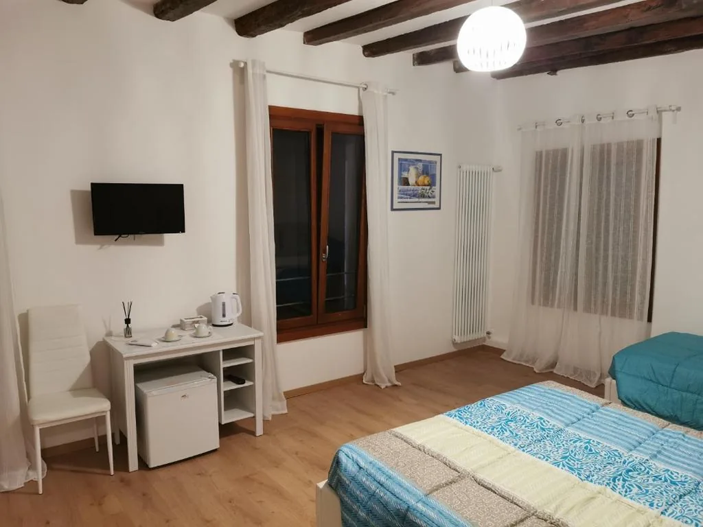 Triple Room with Private Bathroom — Casa Venier
