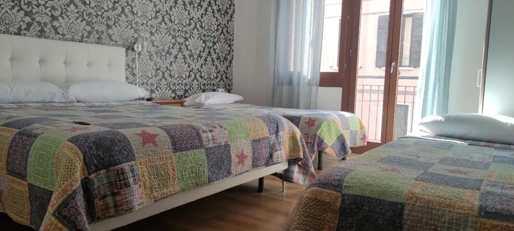 Triple Room with External Private Bathroom — The Caponi Bros