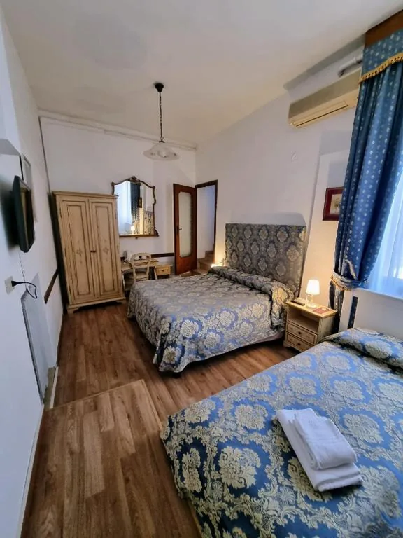 Triple Room with Balcony — Albergo Casa Peron