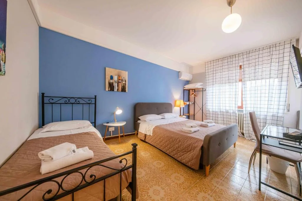 Triple Room with Balcony — Casapiu Rooms