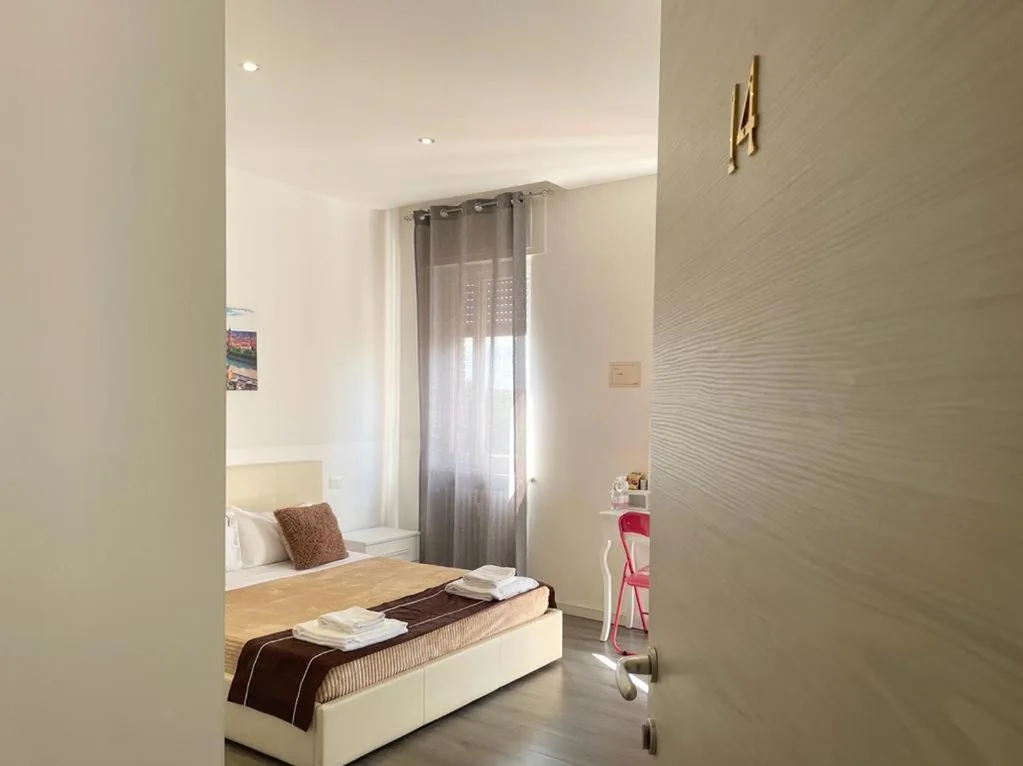 Camera Tripla con Balcone — Confortini Rooms SUNDAY