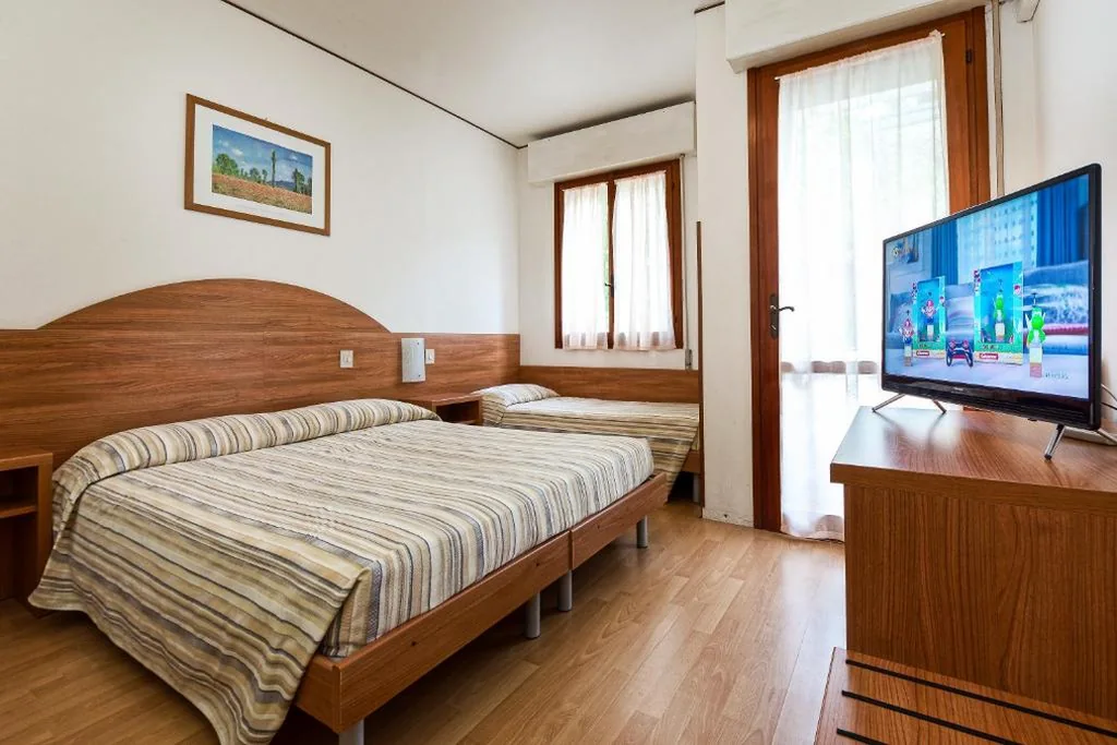 Camera Tripla con Balcone - Dependance — Hotel Eden