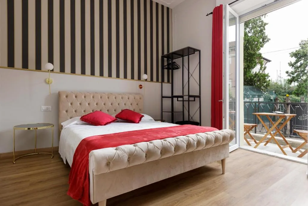 Triple Room with Balcony — Domus 44 Rooms