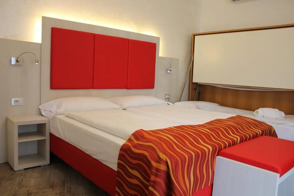 Triple Room with Balcony and Lake View — Hotel Da Tino