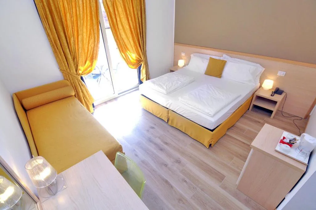 Triple Room with Balcony — Eco Hotel Cleofe