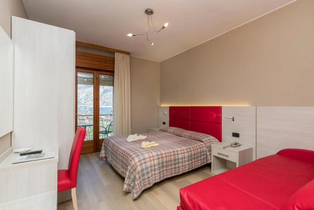 Triple Room with Balcony — Garnì Casa Rabagno