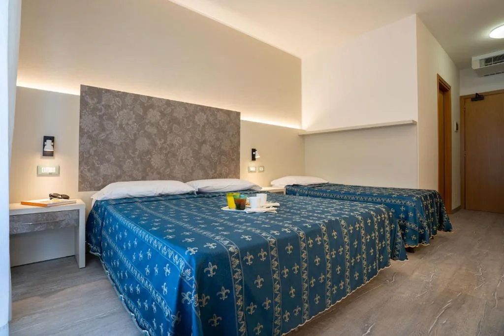 Triple Room with Balcony — Hotel Ca’ D’Oro