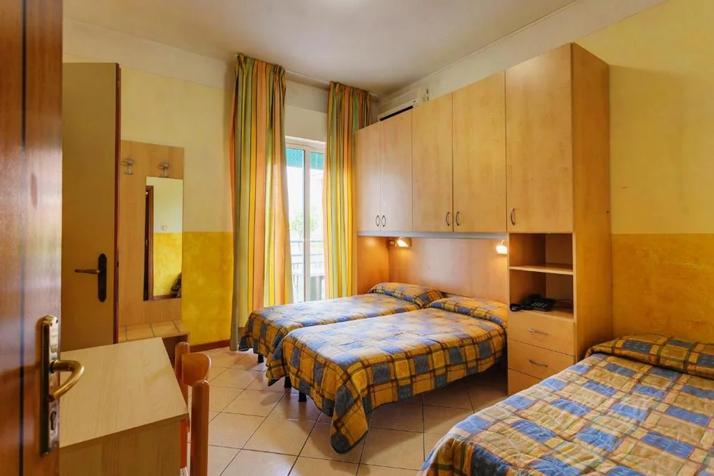 Triple Room with Balcony — Hotel Canova