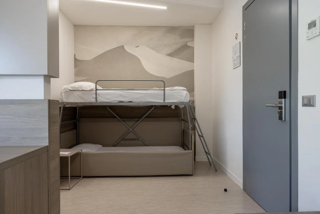 Triple Room with Balcony — Hotel Delle Nazioni – Adults Only