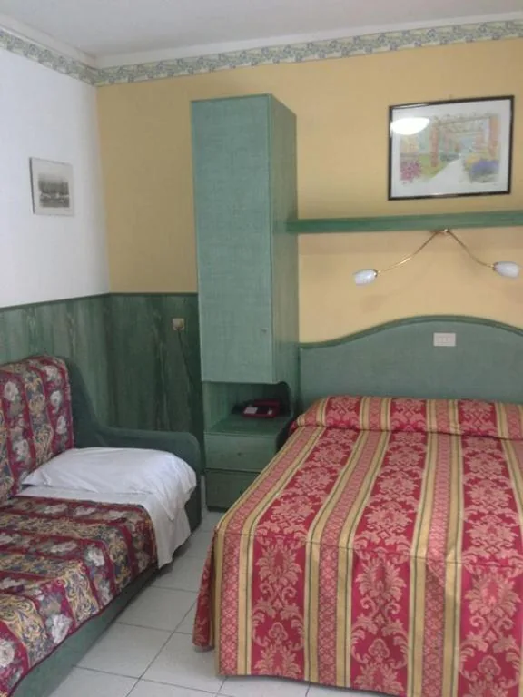 Triple Room with Balcony — Hotel Harry’s