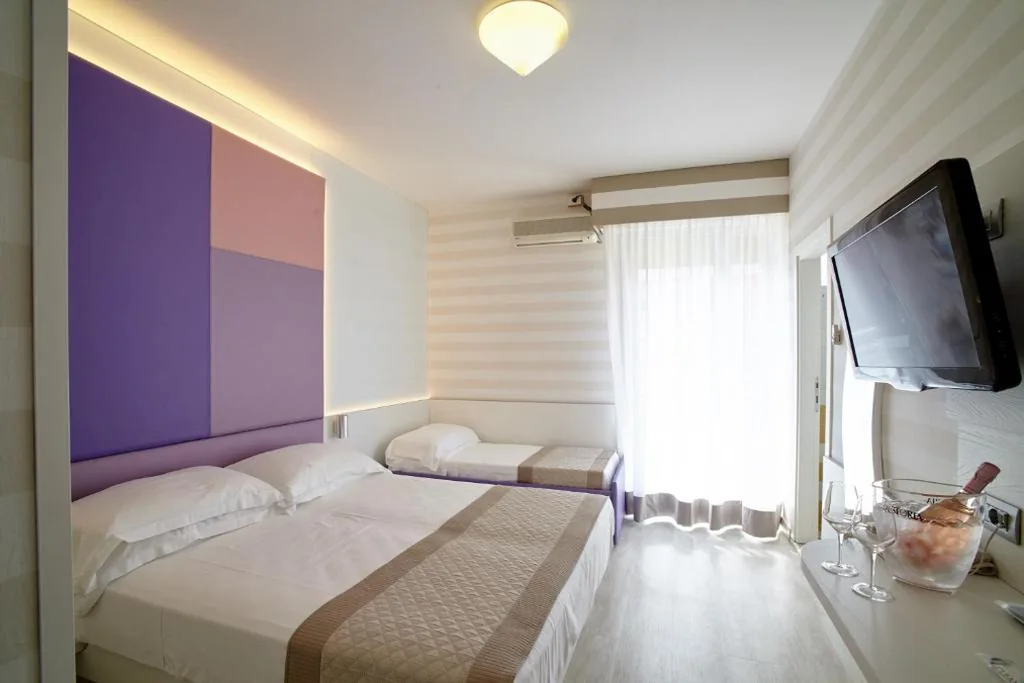 Camera Tripla con Balcone — Hotel Helen