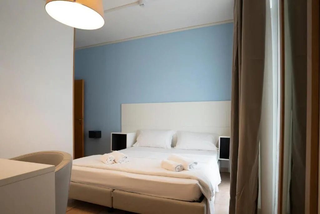Camera Tripla con Balcone — Hotel Minerva