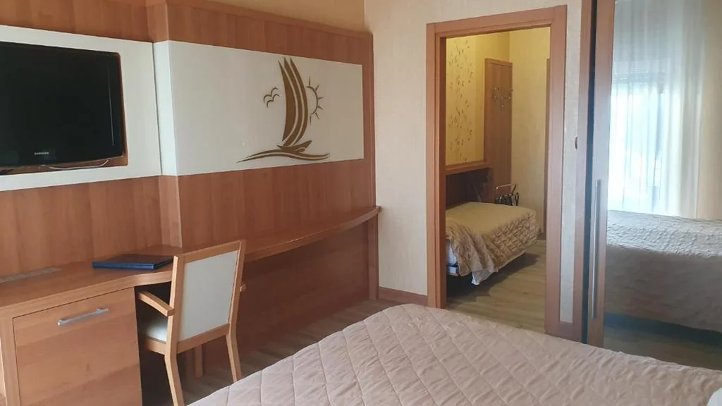 Triple Room with Balcony — Hotel Vela D’oro ***S
