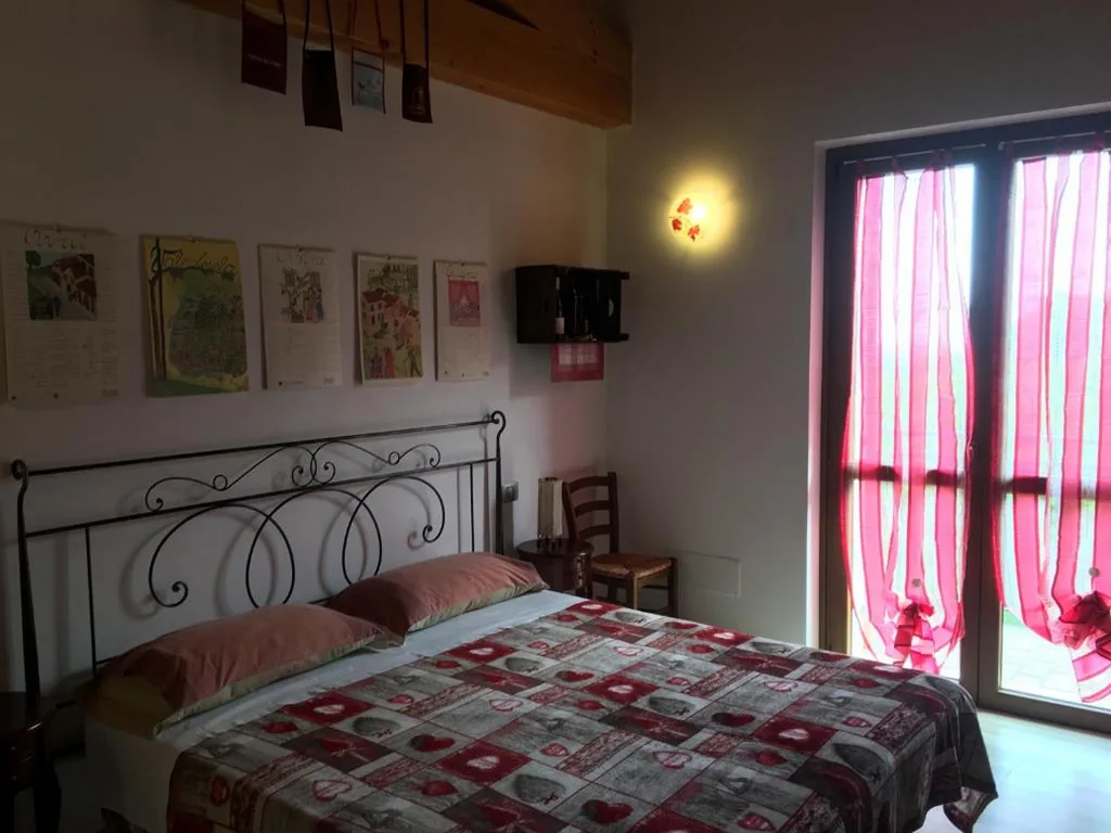 Triple Room with Balcony — La Bella Vigna
