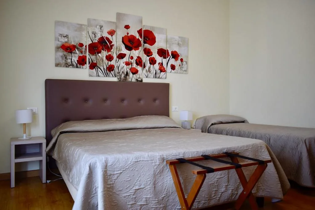 Triple Room with Balcony — La Lanterna
