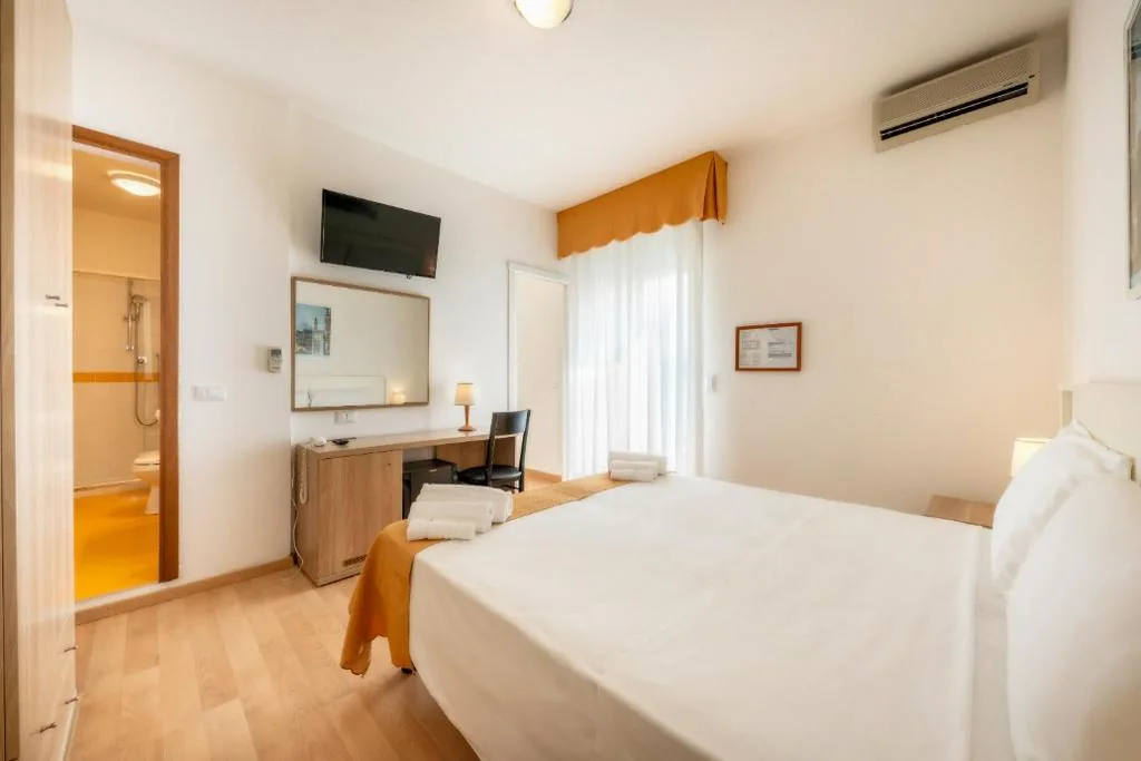 Triple Room with Terrace — Hotel Parigi
