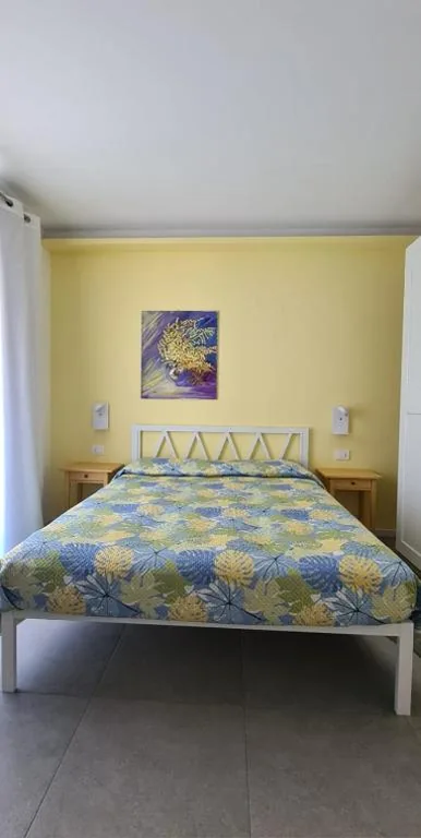 Triple Room with Terrace — Il Melograno