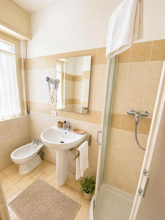 Triple Room with City View — Mariclà Boutique Rooms with Balcony & Free Parking