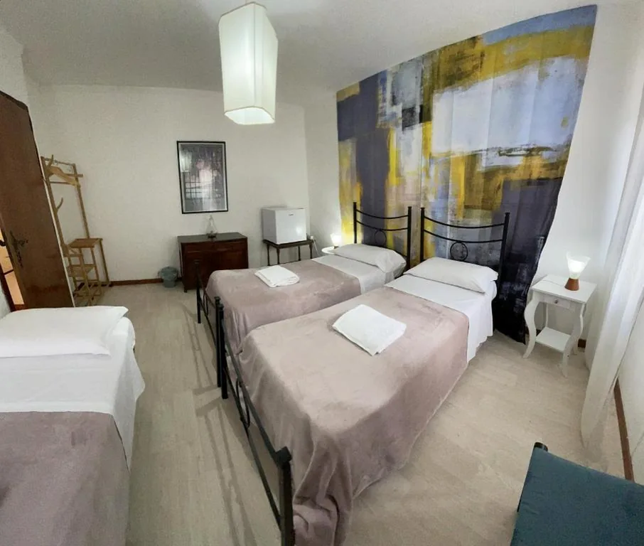 Triple Room with Garden View — Something else in Venice Kingsclass