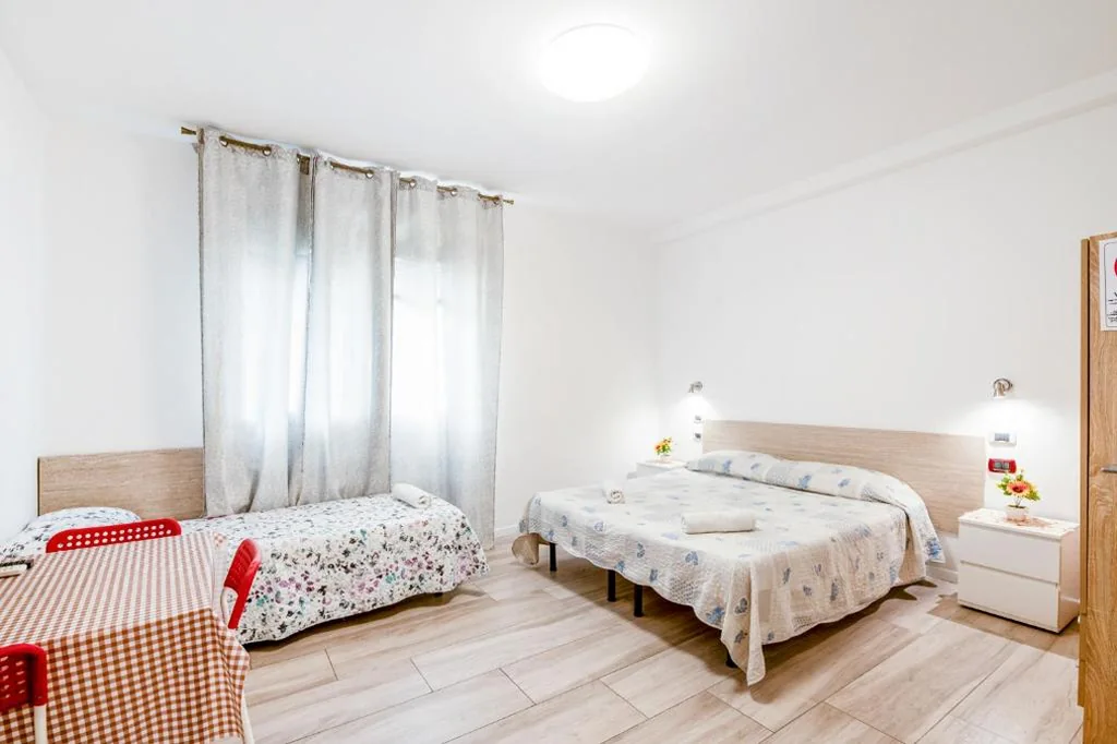 Camera Tripla con Vista Giardino — Villa Trieste