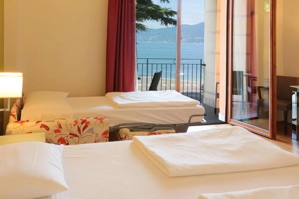 Triple Room with Lake View — Hotel Lido