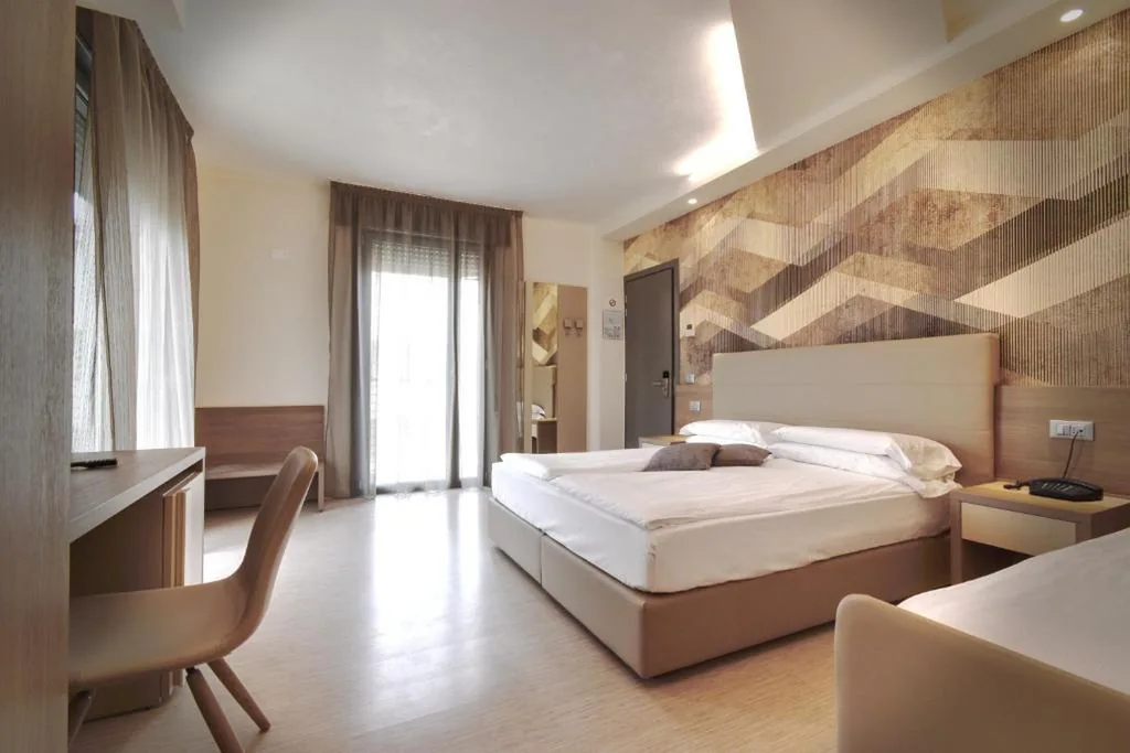 Triple Room with Side Sea View — Hotel Delle Nazioni – Adults Only