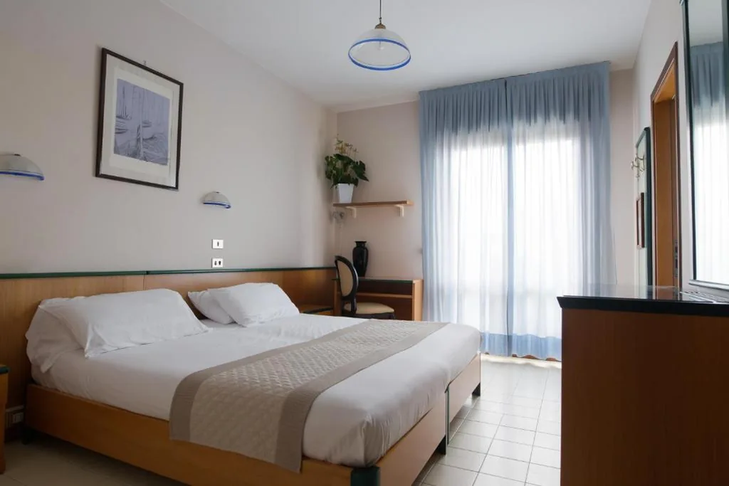 Triple Room with Side Sea View — Hotel Monaco & Quisisana