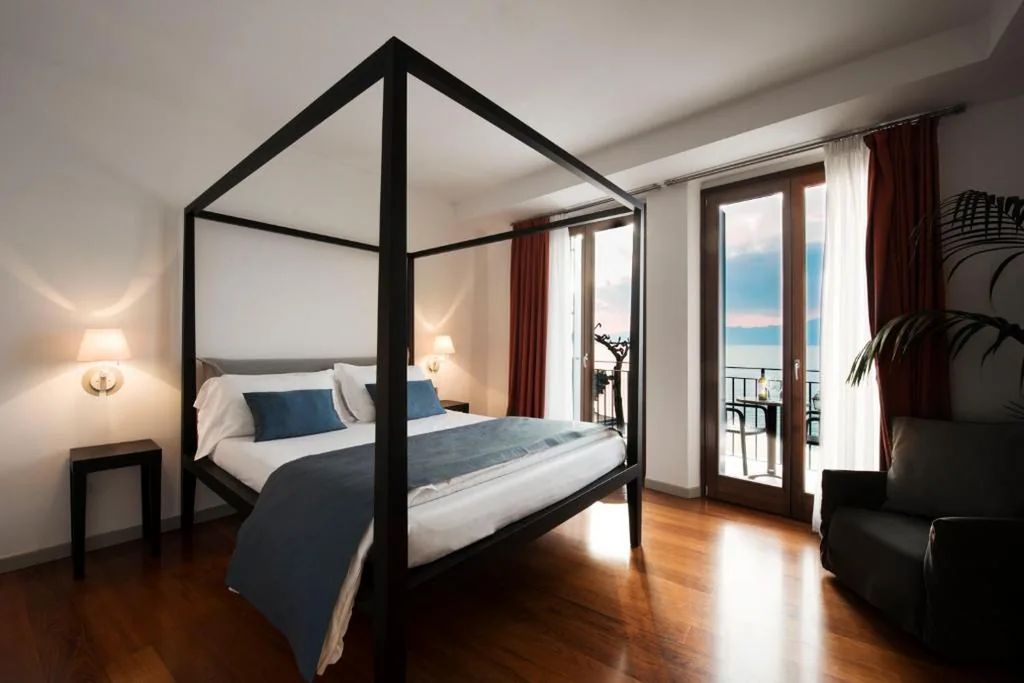 Camera Tripla Deluxe con Vista Lago — Hotel Del Porto