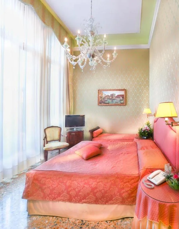Camera Tripla Deluxe — Hotel Colombina