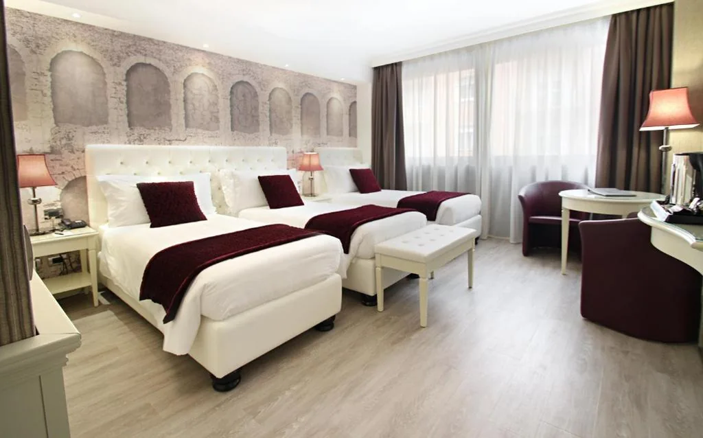 Deluxe Triple Room — Hotel Giberti & Spa