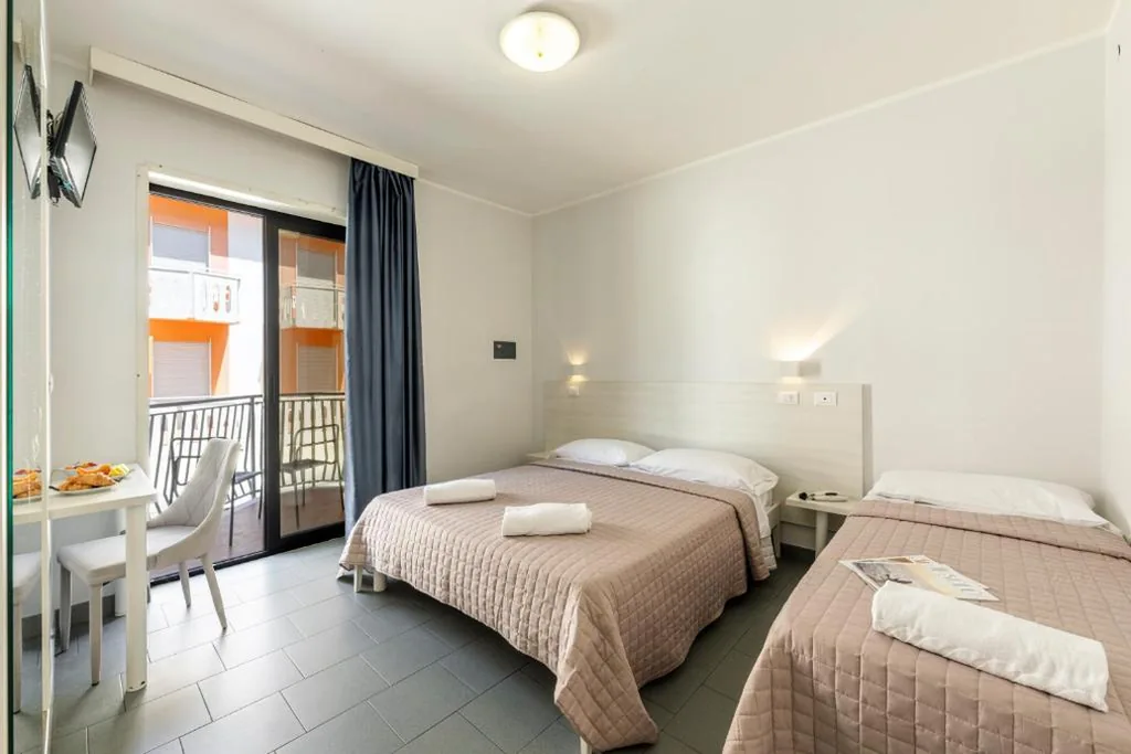 Deluxe Triple Room — Hotel La Siesta
