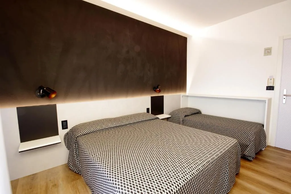 Camera Tripla Deluxe — Hotel Toledo