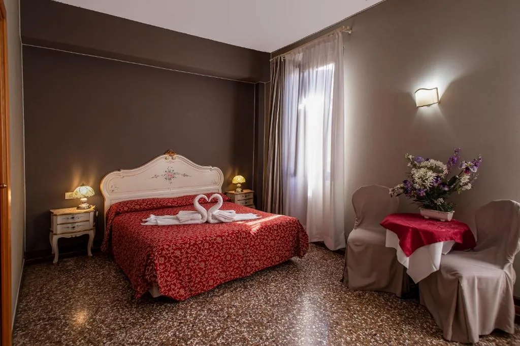 Deluxe Triple Room — Locanda Casa Martini