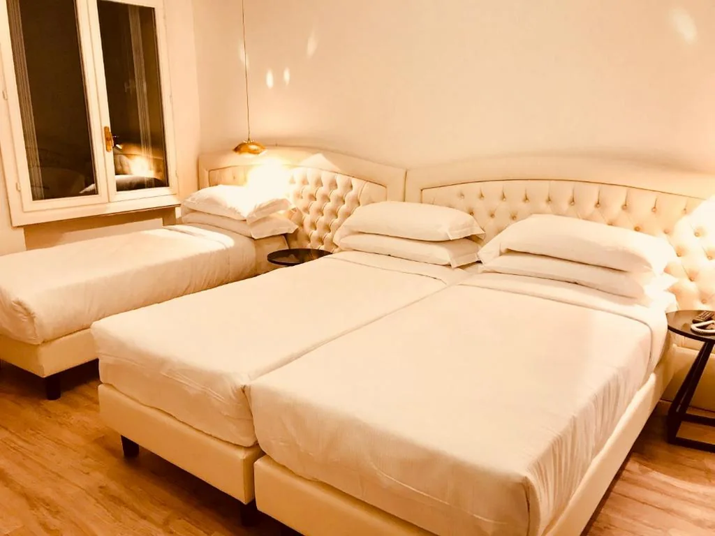 Camera Tripla Deluxe — Palazzo Otello 1847 Wellness & Spa