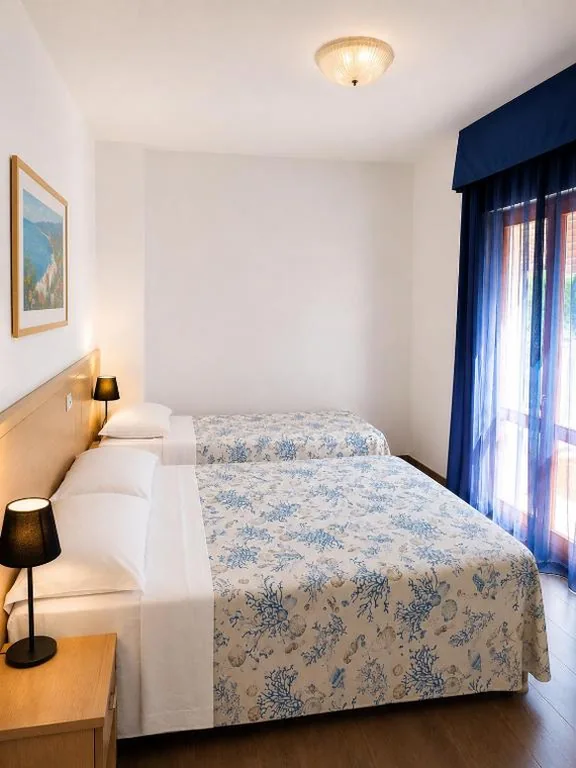 Camera Tripla Economy — Hotel La Fenice