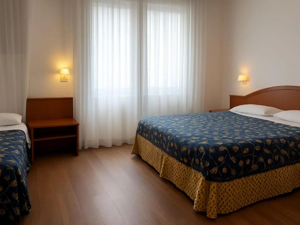 Camera Tripla Economy — Smart Rooms Miramare