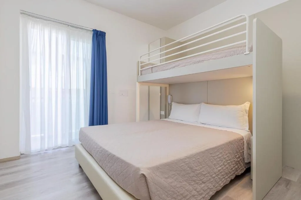 Family Triple Room — Hotel Madera
