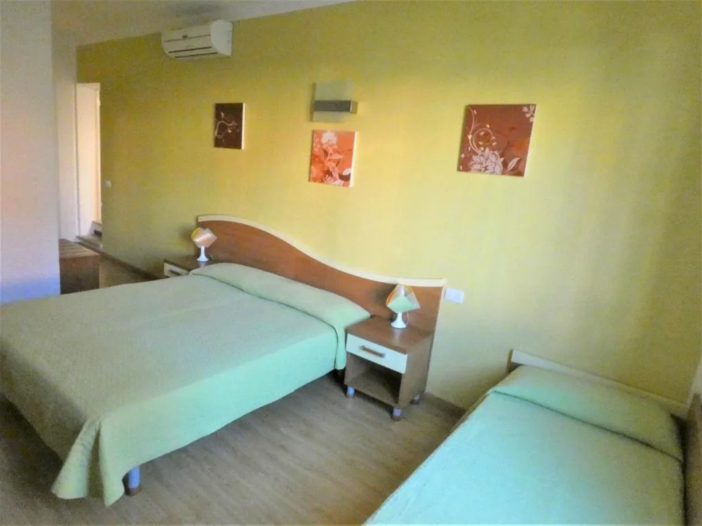 Triple Room — Hotel Alpino