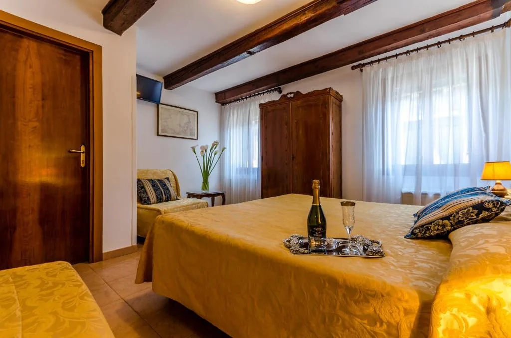 Triple Room — Hotel Ariel Silva