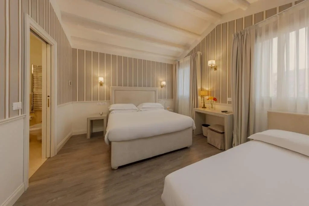 Triple Room — Hotel Bartolomeo