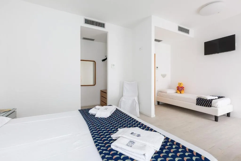 Triple Room — Hotel Cavallino Bianco