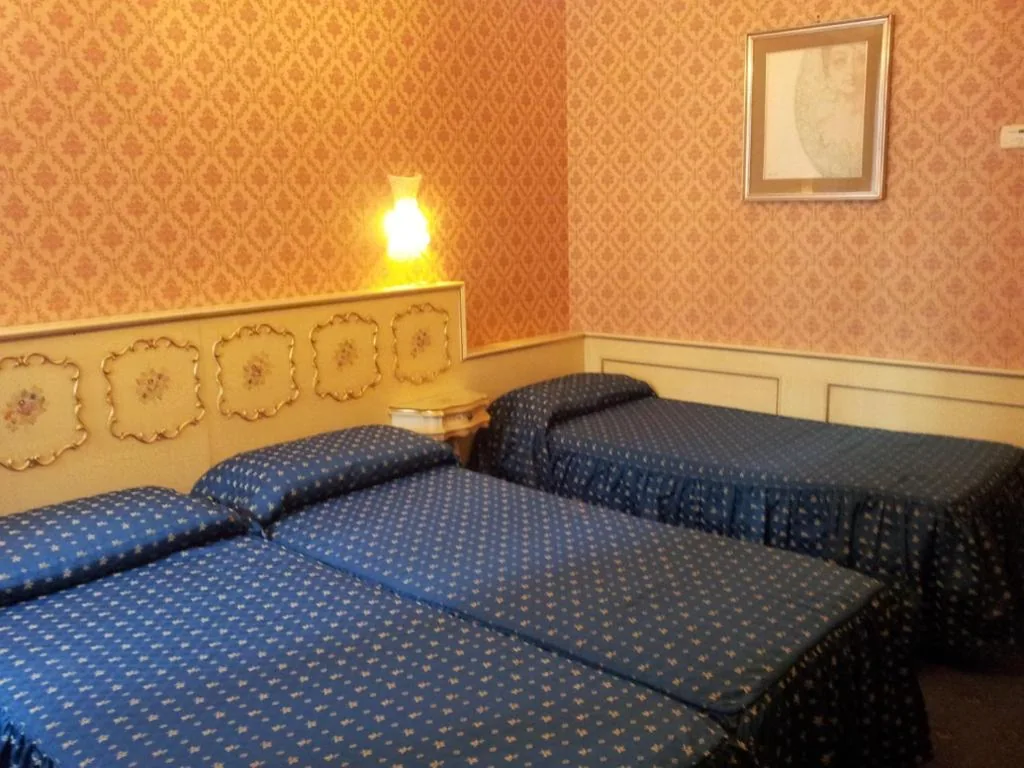 Triple Room — Hotel Diana