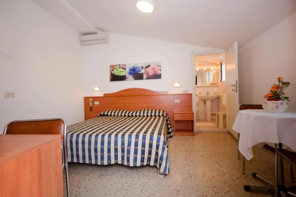 Triple Room — Hotel Erika